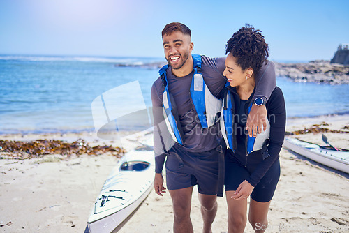 Image of Love, happy and kayak with a couple laughing on the beach for travel, freedom or sports outdoor in nature. Funny, summer vacation or holiday with a man and woman by the sea or ocean for canoeing