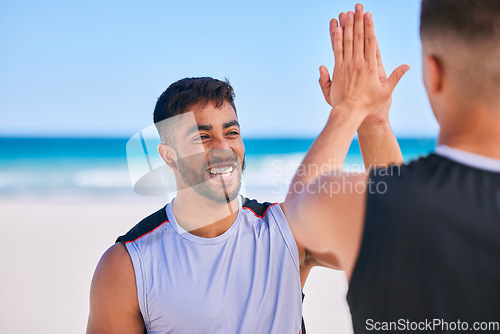 Image of Happy man, high five and teamwork in fitness on beach for workout success, training or outdoor exercise. Excited male person smile or friends in happiness or sports motivation together on ocean coast