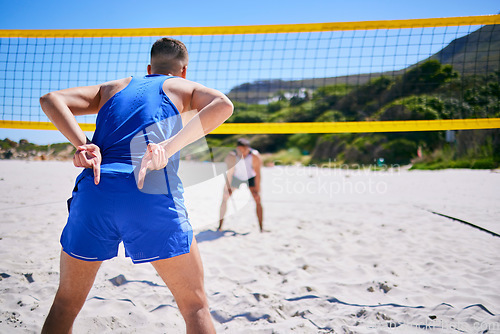 Image of Volleyball, exercise and man at beach with hand sign to block angle of attack. Sports, back and gesture of athlete outdoor in workout, training or competition for healthy body, wellness and summer