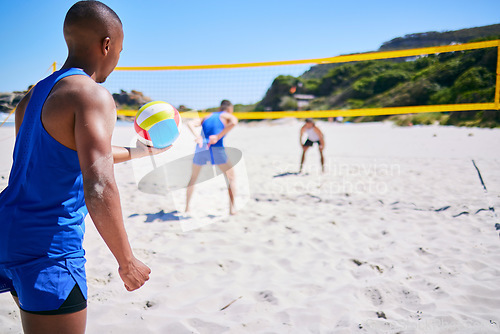 Image of Beach, volleyball or sports team serve ball, playing competition and exercise for group tournament, fitness or game. Nature, sand or back of player workout, training and practice for athlete teamwork