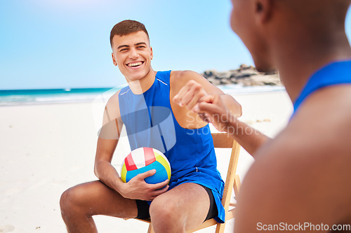 Image of Happy man, volleyball and fist bump on beach in teamwork, winning or outdoor fitness success together. Male person touching hands in team sports, victory or match point and game on the ocean coast