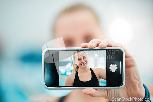 Image of Phone, selfie or happy woman after a swimming exercise, training or workout with photograph. Relax, screen or hand of excited female swimmer taking a picture to post on mobile app on fitness break