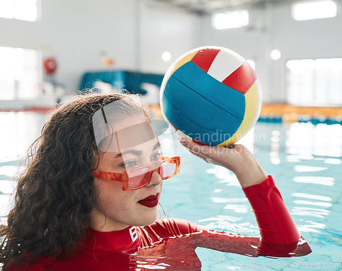 Image of Swimming, water polo and woman with ball, exercise and workout in summer. Sport, sunglasses and person in pool, training and fitness for healthy body, wellness and practice match in competition game