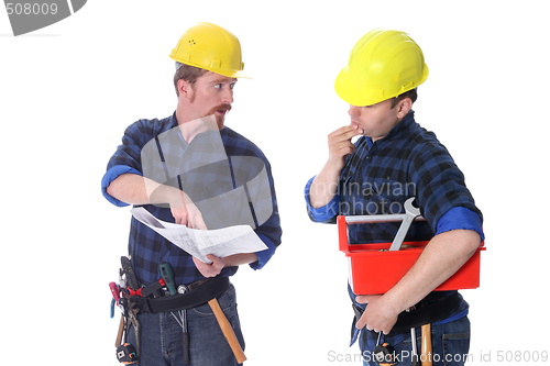 Image of Two construction workers with architectural plans 