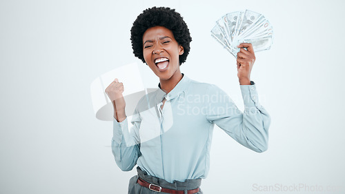 Image of Money win, success and black woman excited about finance freedom, investment and salary on a white studio background. Accounting, happy and portrait of a business employee in celebration of cash