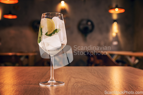 Image of Glass of refreshing alcohol gin tonic cocktail