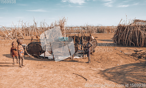 Image of Dasanesh children in village, Omorate, Omo Valley, Ethiopia