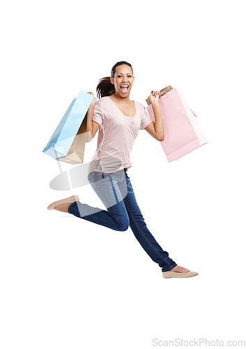 Image of Fashion, portrait and woman jump with shopping bags in studio isolated on white background mockup. Discount celebration, sales deals and happy female customer jumping with gifts after buying at mall