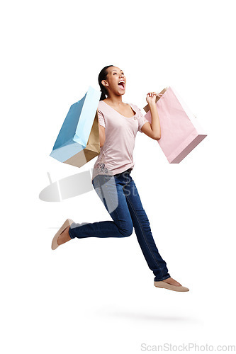 Image of Success, fashion and woman jump with shopping bags in studio isolated on white background mock up. Discount celebration, sales deals and happy female customer jumping with gifts after buying at mall