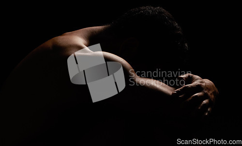 Image of Nude, man with muscle and isolated on black background, strong and skin, silhouette and body in a studio. Sexy, art and sensual with naked person, athlete and model with fitness and bodybuilder