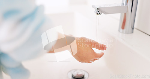 Image of Cleaning, child and girl washing hands in the bathroom with soap for hygiene, healthcare and independence at home. Young, water and healthy kid doing sanitary routine at a sink for toxic bacteria