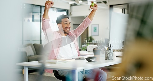 Image of Winner, wow and cheering with a business man reaching a goal or target in his office at work. Motivation, goals and success with a male employee in celebration of a deal or promotion while working