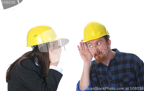 Image of businesswoman and construction worker 