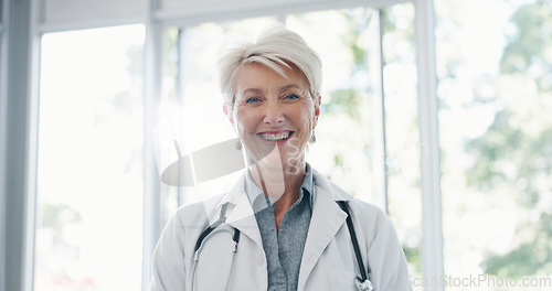 Image of Face, senior woman and doctor for healthcare, wellness or medicine. Mature female, portrait or medical professional with smile, leader or confident with uniform, stethoscope or motivation in hospital