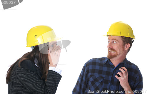 Image of businesswoman and construction worker 