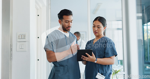 Image of Medical advice, help and doctors with a tablet for healthcare, research and medicine planning. Communication, collaboration and men working in cardiology talking about surgery results on technology