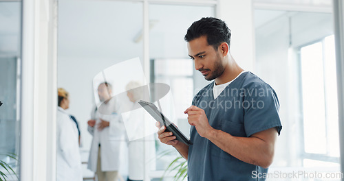 Image of Doctor, tablet and research or planning schedule for healthcare, online medical consultation or search website. Asian man, nurse and reading report or patient analysis on tech device in hospital