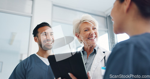 Image of Doctor, team and tablet in discussion with senior for healthcare training, advise or support at hospital. Medical professionals with touchscreen in conversation, collaboration or teamwork at clinic