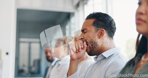 Image of Tired, yawn and sleepless with a business man sitting in a meeting or presentation with his team for development. Yawning, exhausted and bored with a male employee suffering from insomnia at work