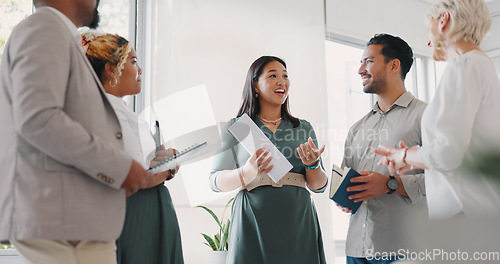 Image of Business meeting, woman and leader with team for planning, thinking and project management in office. Leadership, business people and documents for proposal, startup and idea in meeting for vision