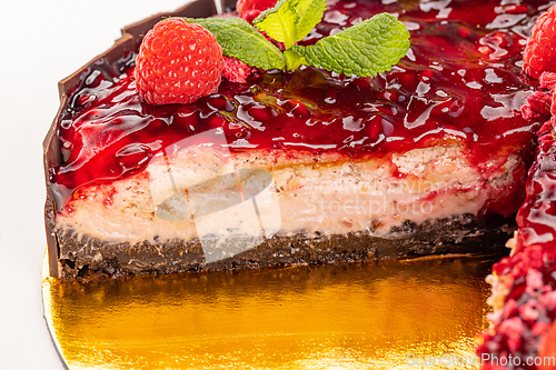 Image of Cheesecake with pomegranate sauce