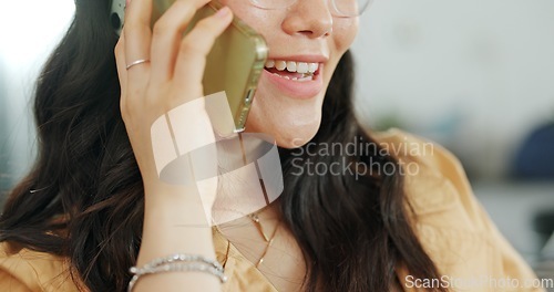 Image of Phone communication, talking and asian woman at home on a sofa with a online conversation. Phone call, speaking and networking of a person on a mobile phone at a living room house on a couch