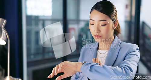 Image of Watch, deadline and computer with a business asian woman working late at night in her office for overtime. Finance, accounting and dedication with a female employee at work in her corporate workplace