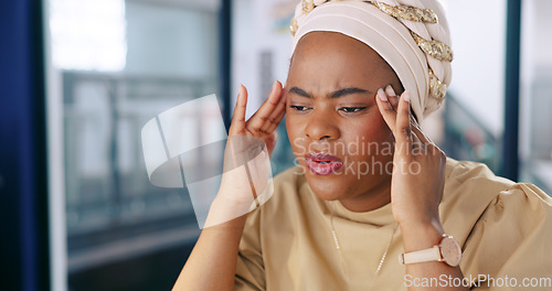 Image of Fashion designer, stress or headache in studio workshop, clothing boutique or retail clothes store. Mental health, burnout or migraine pain and black woman, creative seamstress or cool small business