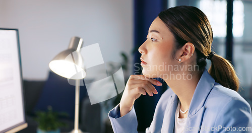 Image of Asian accountant and woman at computer thinking while checking budget on work screen in office. Strategy, problem solving and focus of accounting employee busy with analysis of spreadsheet.