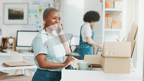 Image of Ecommerce, box and phone call communication for girl in conversation, discussion or talking about product shipping. Supply chain, online shopping sale and black woman speaking on 5g smartphone call