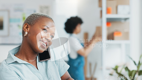 Image of Black, businesswoman and phone call in logistics startup consulting with customer while working at office. Happy African female talking to client or buyer on smartphone in small ecommerce business