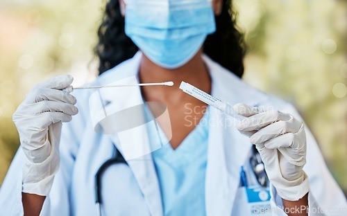 Image of Woman, doctor and hands with nasal swab, mask and gloves holding covid flu test, DNA or sample. Hand of female medical expert with cotton stick for testing, examine or experiment in cure for illness
