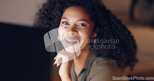 Image of Night office computer, portrait and black woman face working, planning and marketing strategy in creative startup agency in Brazil. Smile, motivation and success of happy entrepreneur dark pc company