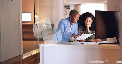 Image of Business woman coaching worker at night modern office, planning documents research and company strategy. Female team employees working overtime on report collaboration, idea analysis and conversation