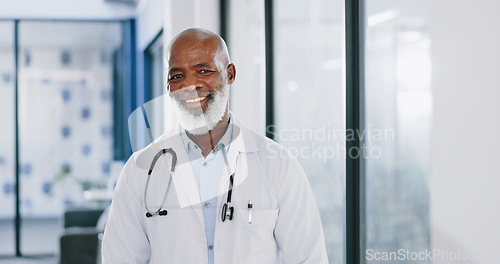 Image of Healthcare, doctor and face of black man in hospital, health facility and clinic for trust, support and help. Insurance, medical care and portrait of senior medical worker with smile for consulting