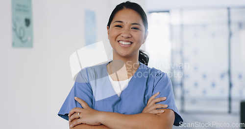 Image of Nurse, face or arms crossed in hospital clinic with wellness motivation, medical research trust or surgery planning motivation. Portrait, smile or happy healthcare worker with confidence in Indonesia