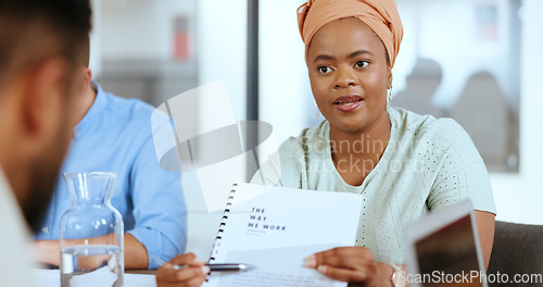 Image of Documents, black woman and business people in a meeting planning a financial growth strategy in a company. Paperwork, portfolio or employee talking, discussion or speaking of goals, mission or vision