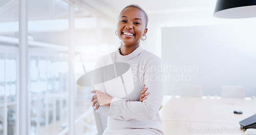 Image of Happy, face and black woman in office building for business management, leadership and vision. Portrait, arms crossed and professional young female in startup agency for success, smile and motivation