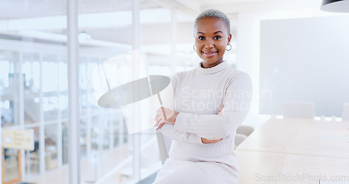 Image of Happy, face and black woman in office building for business management, leadership and vision. Portrait, arms crossed and professional young female in startup agency for success, smile and motivation