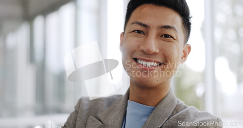 Image of Singapore, leadership or portrait of a businessman with a smile in office of a startup company. Happy, motivation or manager for target mindset, goal or success with his arms crossed in workspace.