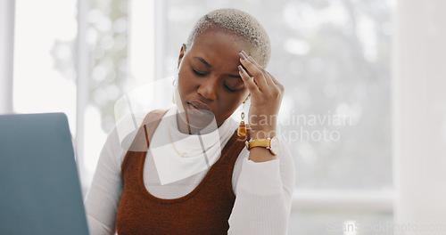 Image of Burnout, stress and professional black woman on a laptop working on project with a deadline. Overworked, frustration and African business employee with a headache doing research on computer in office