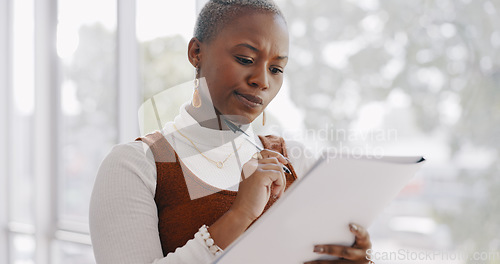 Image of Business, thinking and black woman writing on documents working on report, project and proposal. Vision, ideas and busy female worker with paperwork in office brainstorming, planning and strategy