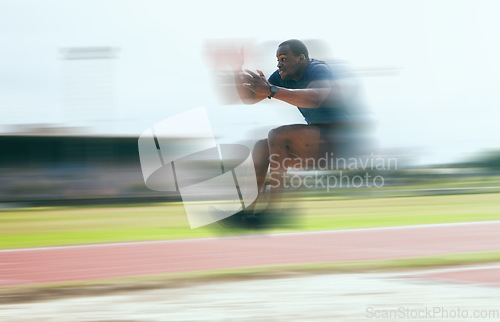 Image of Black man, fitness and high jump exercise at stadium for training, workout or practice. Sports, health and male athlete exercising and jumping for fast performance, endurance and competition outdoors