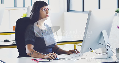 Image of Business, woman and computer for typing, focus and digital planning for sales, advertising and modern office. Female employee thinking, administrator and manager with pc, online reading or web design