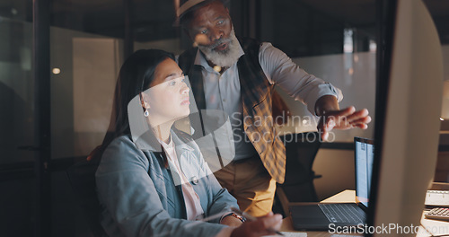 Image of Office, overtime and woman with manager at computer, coaching for worker on online project for digital marketing company. Teamwork, advice and support from management for girl working late at night.