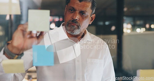 Image of CEO, sticky note or senior manager writing a marketing strategy or brainstorming ideas for business growth. Businessman, boss or Indian entrepreneur with mission, goals or vision planning a project