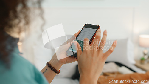 Image of Woman hands, phone and travel website or social media scroll of a person booking a vacation. Holiday research ui, online and planning on a mobile in a bedroom on the internet at home reading a blog