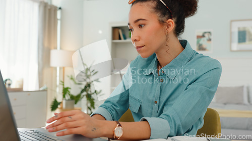 Image of Laptop, black woman and typing at table in work from home office, internet research and seo technology. Female freelancer, social media blog and remote working on computer, email and website at desk