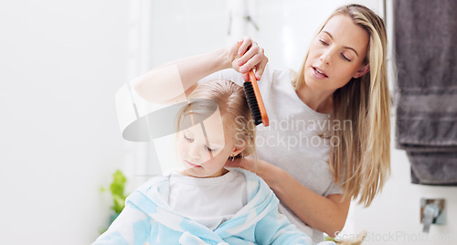 Image of Morning, mother and daughter in bathroom with hair brush for grooming care routine in family home. Motherhood, child and mama brushing hair of young kid in house and getting ready for the day.