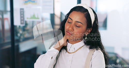 Image of Neck pain, business woman and burnout of a digital marketing employee in a office. Working, stress and anxiety of a tired professional planning a web project feeling fatigue from headache and pain